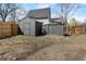 Backyard with two sheds and unfinished lawn offers potential for outdoor recreation and landscaping at 2207 E 25Th, Denver, CO 80205
