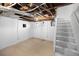 Unfinished basement area with wood flooring at 2207 E 25Th, Denver, CO 80205