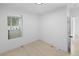 Bright bedroom with hardwood floors and window at 2207 E 25Th, Denver, CO 80205