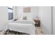 Comfortable bedroom features a queen bed, bedside tables, and a modern design at 2207 E 25Th, Denver, CO 80205