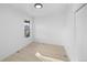 Simple bedroom with hardwood floors and a window at 2207 E 25Th, Denver, CO 80205