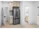 Stainless steel refrigerator in updated kitchen at 2207 E 25Th, Denver, CO 80205