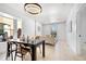 Inviting living room and dining area boasts an open layout and natural light at 2207 E 25Th, Denver, CO 80205