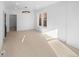 Light-filled living room, hardwood floors, and modern lighting at 2207 E 25Th, Denver, CO 80205