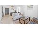 Bright living room featuring a couch, stylish coffee table, and modern decor at 2207 E 25Th, Denver, CO 80205