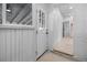 Mud room with door to exterior and interior, wood floors and light walls at 2207 E 25Th, Denver, CO 80205