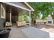 Backyard patio featuring outdoor seating and an inviting fireplace, perfect for entertaining at 5795 S Pagosa Way, Centennial, CO 80015