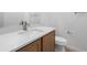 Bathroom featuring white quartz countertop and modern fixtures at 6153 N Ceylon St # 307, Denver, CO 80249