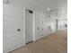 Hallway exterior with individual unit doors and exterior siding at 6153 N Ceylon St # 307, Denver, CO 80249