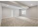 Spacious finished basement with recessed lighting and window at 16227 Pikes Peak Dr, Broomfield, CO 80023