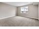Bright bedroom with a large window providing ample natural light at 16227 Pikes Peak Dr, Broomfield, CO 80023