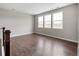 Bonus room features large windows that offer plentiful natural light and luxury vinyl plank flooring at 16227 Pikes Peak Dr, Broomfield, CO 80023