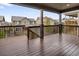 Spacious wooden deck with railings offers a view of the surrounding neighborhood at 16227 Pikes Peak Dr, Broomfield, CO 80023