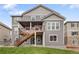 Back of house featuring a large deck and backyard space at 16227 Pikes Peak Dr, Broomfield, CO 80023