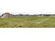 Open sports field with soccer nets and neighborhood houses in the distance at 16227 Pikes Peak Dr, Broomfield, CO 80023