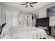 The main bedroom features a spacious closet, and luxury vinyl plank flooring at 16227 Pikes Peak Dr, Broomfield, CO 80023