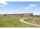 Exterior view of school and grounds near homes at 16227 Pikes Peak Dr, Broomfield, CO 80023