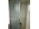 Bathroom shower stall with glass doors and white tiled walls at 9062 Utica St, Westminster, CO 80031