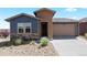Charming two-story home featuring a two-car garage and a beautifully landscaped front yard with stone accents at 10723 N Montane Dr, Broomfield, CO 80021