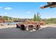 Outdoor fire pit area with seating, grill and pool views, ideal for gatherings and relaxation at 10723 N Montane Dr, Broomfield, CO 80021