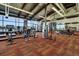 Bright gym featuring modern exercise equipment, a large window, and a colorful patterned floor at 10723 N Montane Dr, Broomfield, CO 80021
