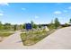Walking path to Skyestone Pond, featuring lush greenery and serene views for outdoor enjoyment at 10723 N Montane Dr, Broomfield, CO 80021