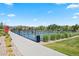 Fenced tennis court in a residential community, providing recreational opportunities for residents at 10723 N Montane Dr, Broomfield, CO 80021