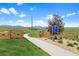 Scenic walking trail featuring a lake, mountains, and lush meadows at 10723 N Montane Dr, Broomfield, CO 80021