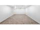 Spacious unfinished basement with neutral carpet and ample potential at 1148 N Clinton St, Aurora, CO 80010