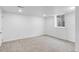 Finished room with carpeted floors and natural light from the window well at 1148 N Clinton St, Aurora, CO 80010