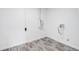 Utility room with laminate flooring and hookups at 1148 N Clinton St, Aurora, CO 80010