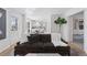 Relaxing living room with hardwood floors and views of the kitchen and dining areas at 3850 S Willow Way, Denver, CO 80237