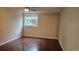 Bedroom featuring hardwood floors and a ceiling fan at 12450 E Cornell Ave # 101, Aurora, CO 80014