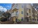 Condo building with brick accents and multiple balconies at 12450 E Cornell Ave # 101, Aurora, CO 80014