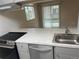 Well-equipped kitchen with stainless steel appliances and sleek countertops, ready for cooking at 12450 E Cornell Ave # 101, Aurora, CO 80014