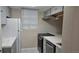 Kitchen featuring modern appliances and marble countertops at 12450 E Cornell Ave # 101, Aurora, CO 80014