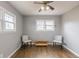 Neutral bedroom with hardwood floors, ample natural light, and simple decor at 1345 Laredo St, Aurora, CO 80011
