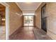 Brick patio with sliding glass doors leading to the backyard at 1345 Laredo St, Aurora, CO 80011