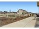 Backyard view featuring an outdoor patio and fence at 6045 High Timber Cir, Castle Rock, CO 80104