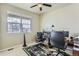 Home office features natural light, desk, overhead fan and contemporary decor at 6045 High Timber Cir, Castle Rock, CO 80104