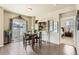 Cozy dining area with hardwood floors, a sliding glass door, and stylish decor throughout at 6045 High Timber Cir, Castle Rock, CO 80104
