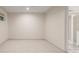 Spacious basement with neutral carpet, light walls and a small window at 3912 S Richfield Way, Aurora, CO 80013