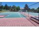 Multi-use sports court, including basketball, volleyball and tennis, for an active lifestyle within the community at 3912 S Richfield Way, Aurora, CO 80013