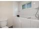 Modern bathroom featuring a walk-in tub for accessibility and comfort at 3912 S Richfield Way, Aurora, CO 80013