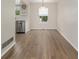 Bright dining area with hardwood floors and adjacent kitchen space at 3912 S Richfield Way, Aurora, CO 80013
