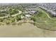 Community clubhouse and pool next to a pond and walking path in a Primary planned community at 3056 Yale Dr, Broomfield, CO 80023