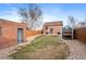 Large backyard with storage shed and detached garage at 3633 N Cook St, Denver, CO 80205