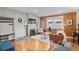 Living room features hardwood floors and a modern fireplace at 3633 N Cook St, Denver, CO 80205