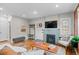 Living room with hardwood floors and a cozy seating area at 3633 N Cook St, Denver, CO 80205