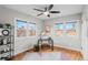 Home office with hardwood floors and built in shelving at 3633 N Cook St, Denver, CO 80205